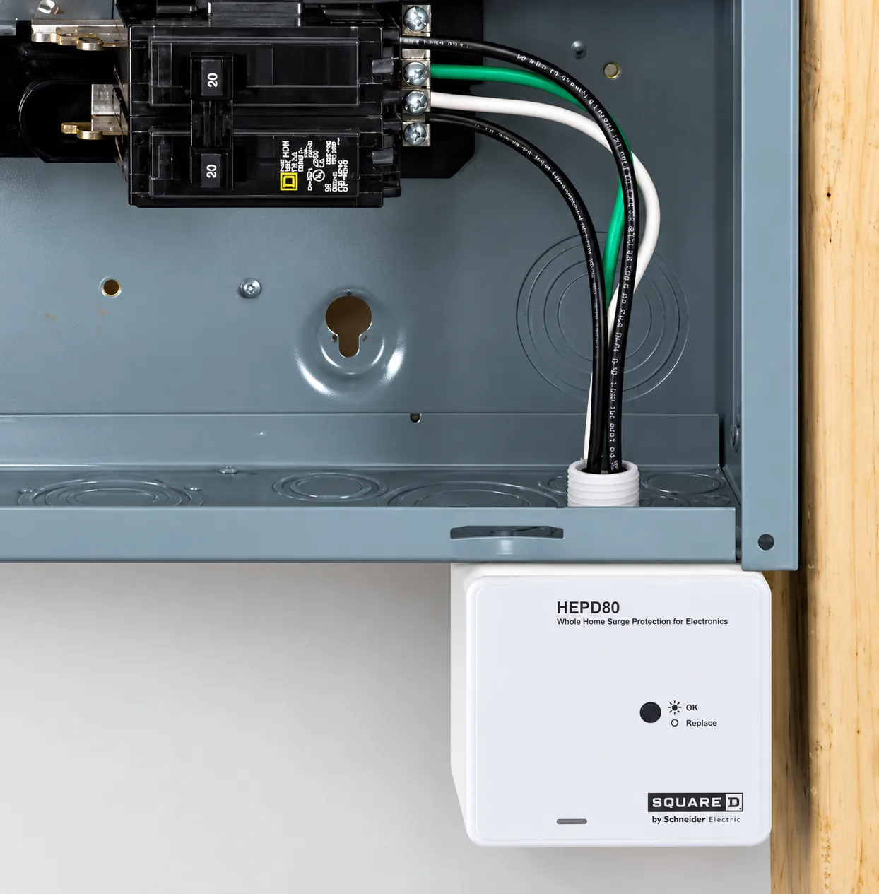 Whole-home surge protector installed at an electrical panel by Cornerstone Electrical